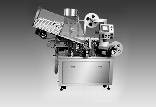B.KFX-II Tube Holing, Sealing & Capping Machine.